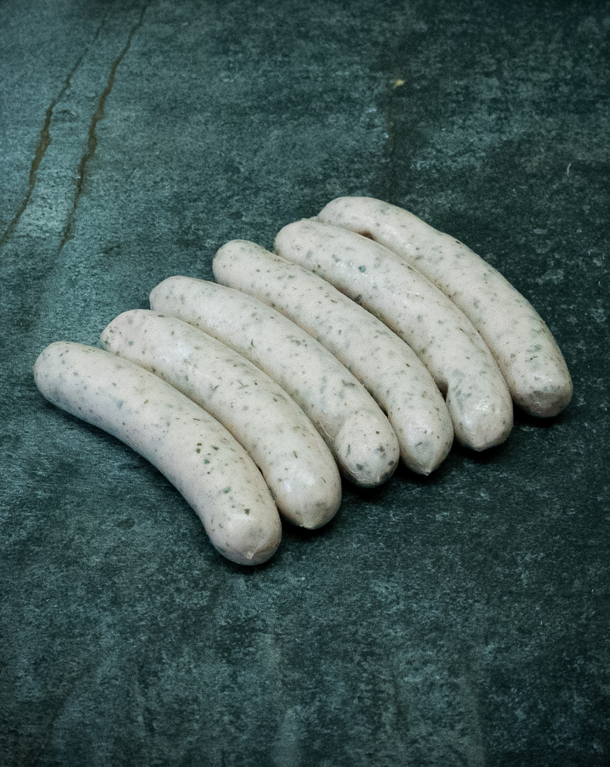 Mini Rostbratwurst – fein gewürzt & vorgegart Mini Rostbratwurst aus deutschem Schweinefleisch auf Grillrost